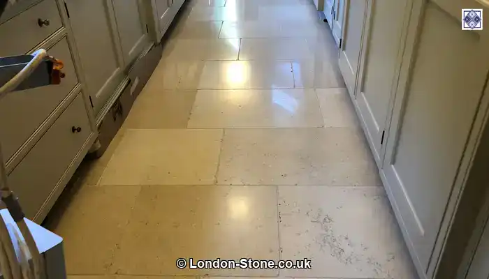 Restored limestone floor in a Buckinghamshire kitchen-diner showing a soft satin finish that suits everyday family use.